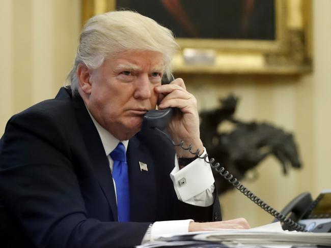 President Donald Trump speaks on the phone with Prime Minister of Australia Malcolm Turnbull in the Oval Office of the White House. Picture: AP