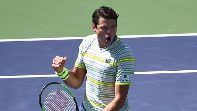 Milos Raonic of Canada celebrates after defeating Sam Query of United States.