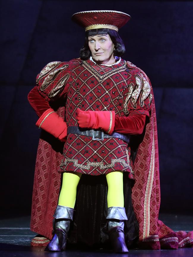 Todd McKenney on his knees as Lord Farquaad in Shrek The Musical. (AAP Image/David Crosling)