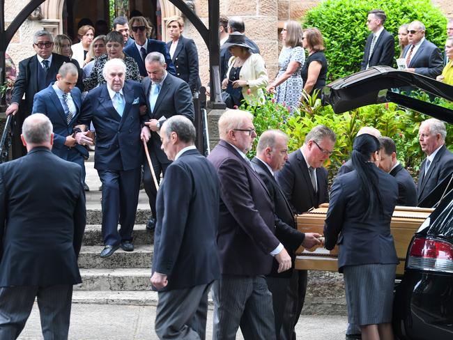 As Caroline’s coffin was carried from the church, John Laws followed with tears streaming down his face. Picture: AAP