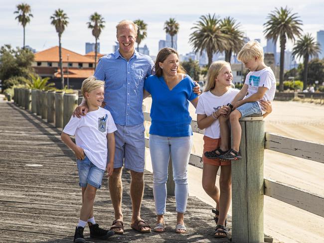 22/01/21 Sophie and Patrick Haseler pictured at Port Melbourne beach with their kids Caitlin (10), Charlie (8) and Toby (6). Patrick and Sophie lived through the Victorian homeschooling and work lockdown. Aaron Francis/The Australian