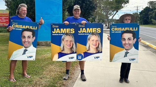 Michael Trout (centre) campaigns on behalf of LNP candidate for Barron River, Bree James.