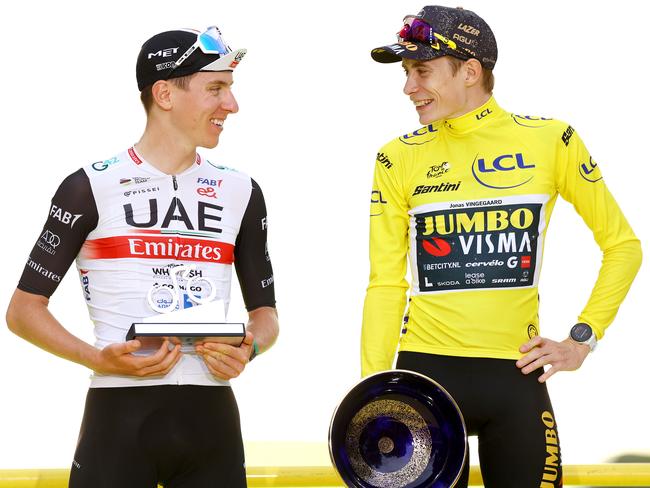 PARIS, FRANCE - JULY 23: (L-R) Tadej Pogacar of Slovenia and UAE Team Emirates on second place and race winner Jonas Vingegaard of Denmark and Team Jumbo-Visma - Yellow Leader Jersey pose on the podium ceremony after the stage twenty-one of the 110th Tour de France 2023 a 11 5.1km stage from Saint-Quentin-en-Yvelines to Paris / #UCIWT / on July 23, 2023 in Paris, France. (Photo by Michael Steele/Getty Images)