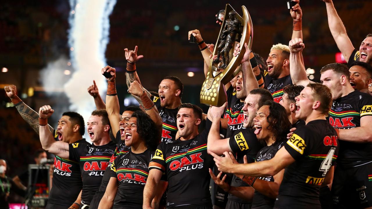 BRISBANE, AUSTRALIA - OCTOBER 03: The Panthers celebrate with the NRL Premiership Trophy after victory in the 2021 NRL Grand Final match between the Penrith Panthers and the South Sydney Rabbitohs at Suncorp Stadium on October 03, 2021, in Brisbane, Australia. (Photo by Chris Hyde/Getty Images)