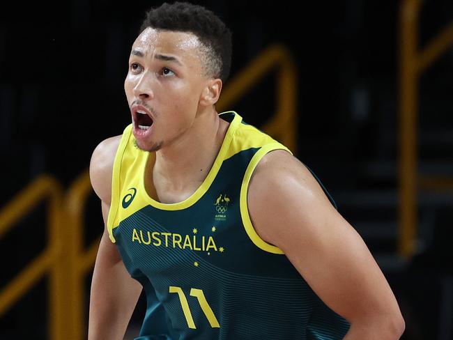 SAITAMA, JAPAN - AUGUST 07: Dante Exum #11 of Team Australia celebrates against Team Slovenia during the second half of the Men's Basketball Bronze medal game on day fifteen of the Tokyo 2020 Olympic Games at Saitama Super Arena on August 07, 2021 in Saitama, Japan. (Photo by Kevin C. Cox/Getty Images)