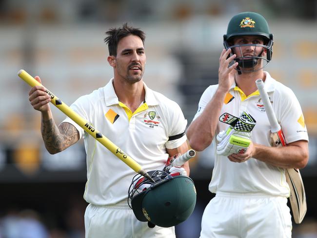 Mitchell Johnson and Mitchell Marsh celebrate the winning runs. Picture: Adam Head