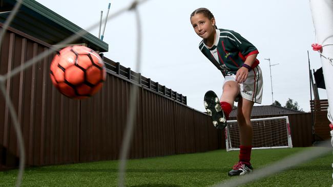 Junior Sports Star Ella Abdul Massih, pictured in her backyard in St Clair is an ace soccer and futsal player.