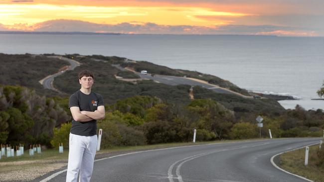 Aaron Tremul, 16, on the road at Bells Beach where he was struck from behind on his bike and almost killed. Picture: Alison Wynd