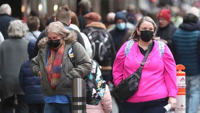 Australians are being urged to wear masks again. Picture: NCA NewsWire / David Crosling