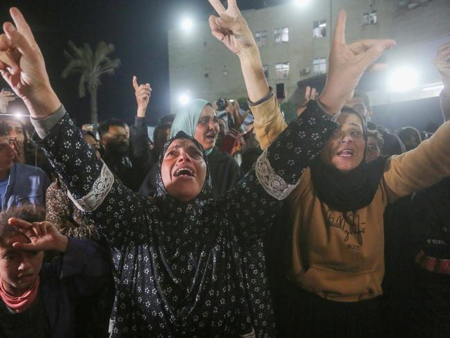 Palestinians gather to celebrate after the announcement of the Israel-Hamas ceasefire and hostage exchange deal. Picture: Getty Images