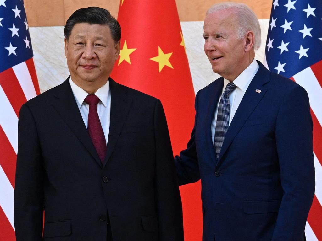 (FILES) US President Joe Biden (R) and China's President Xi Jinping (L) meet on the sidelines of the G20 Summit in Nusa Dua on the Indonesian resort island of Bali on November 14, 2022. China's top diplomat will pay a rare visit to Washington this week, the United States announced October 23, 2023, paving the way for a potential visit by President Xi Jinping aimed at keeping tensions in check. Foreign Minister Wang Yi, the highest-ranking Chinese official in the US capital in nearly five years, will visit from October 26 through October 28 against a backdrop of friction over trade, Ukraine, the Middle East, Taiwan and China's assertive actions at sea near the Philippines. (Photo by SAUL LOEB / AFP)