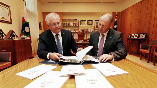 Prime Minister Scott Morrison with Treasurer Josh Frydenberg look over the budget papers ahead of tonight's budget announcement at Parliament House on Tuesday, October 6, 2020. Picture: Adam Taylor for PMO via NCA NewsWire