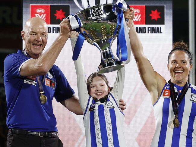 NCA. MELBOURNE, AUSTRALIA. 30th November 2024.  AFLW Grand Final. North Melbourne vs Brisbane at IKON Park, Carlton .  Captain Emma Kearney , coach Darren Crocker and Cup presenter  Imogen Mulgrew    .  Picture: Michael Klein