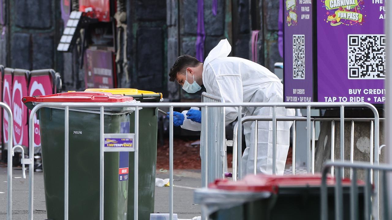 Forensics on Tuesday dusted bins for prints near where the teen was stabbed. Picture: NCA NewsWire/Damian Shaw