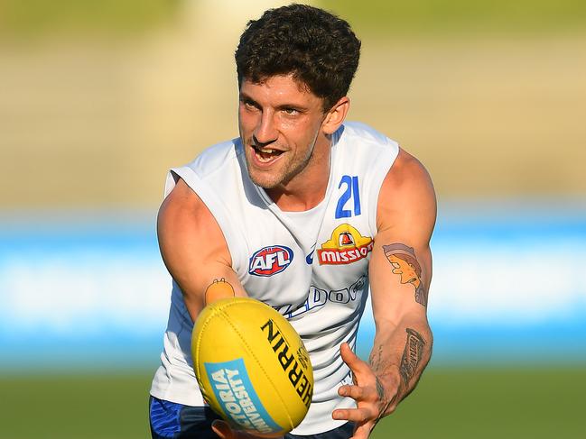 MELBOURNE, AUSTRALIA - MAY 07: Tom Liberatore of the Bulldogs marks during a Western Bulldogs AFL training session at Whitten Oval on May 07, 2019 in Melbourne, Australia. (Photo by Quinn Rooney/Getty Images)