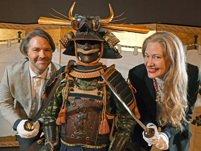 22/07/20 - Associate curator of Asian art Russell Kelty and Art Gallery of SA director Rhana Devenport in front of samurai armour display ahead of the Samurai exhibition.Picture: Tom Huntley