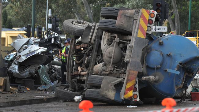 The Cleanaway truck at the bottom of the freeway, after the horrific smash. Charges against the company have been dropped. Picture: Roger Wyman