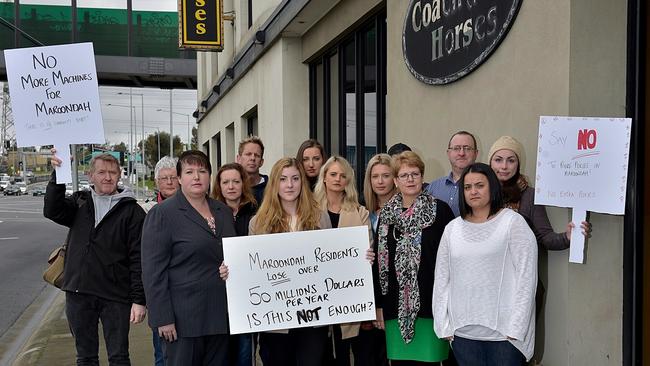 Maroondah councillor Mary-Anne Lowe (third from left) with angry residents outside the Coach and Horses hotel, Ringwood. Picture: Andrew Batsch