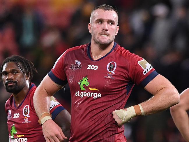 Izack Rodda of the Reds (right) reacts following the Round 15 Super Rugby match between the Queensland Reds and the Highlanders at Suncorp Stadium in Brisbane, Saturday, May 26, 2018. (AAP Image/Dave Hunt) NO ARCHIVING, EDITORIAL USE ONLY