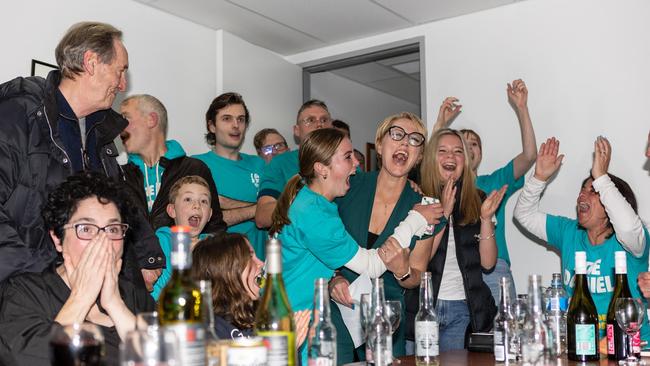 Family and friends erupt with delight after ABC election pundit Antony Green called Zoe Daniel as the winner at 9.16pm. Picture: Bernard Wright.