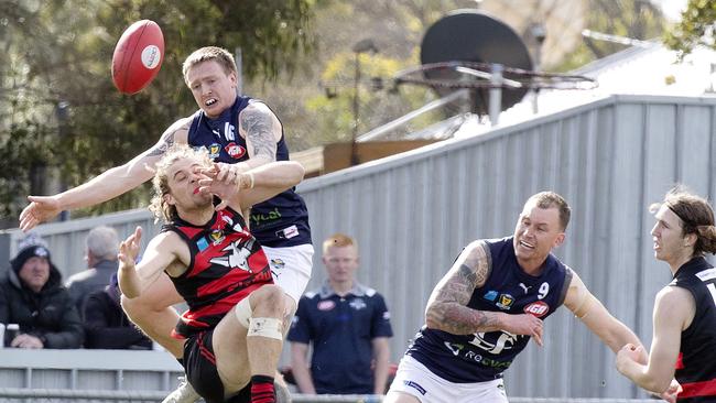 Lauderdale’s Oscar Shaw and Launceston’s Dylan Riley collide as they challenge for the ball. Picture: Chris Kidd