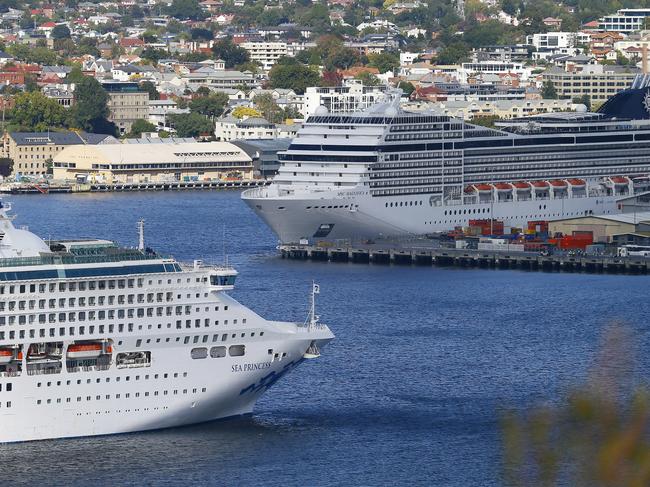 The Coronavirus (COVID - 19) has heavily disrupted the cruise ship industry.  Pictured is the MSC Magnifica (berthed) while the Sea Princess prepares to dock.  Passengers aboard the Magnifica are not allowed to disembark.Picture: MATT THOMPSON