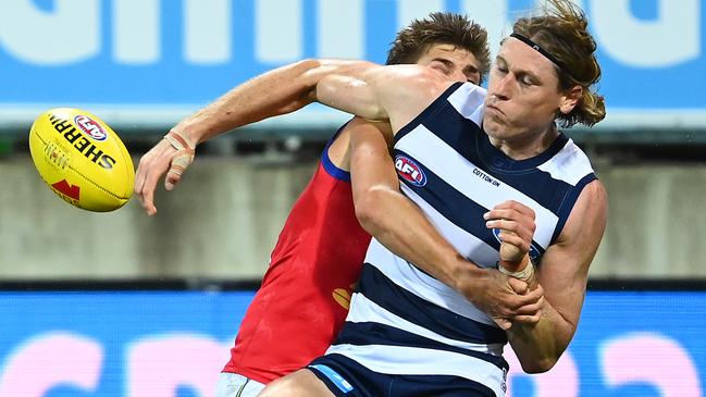 The decision not to ping Cats defender Mark Blicavs with holding the ball likely cost the Lions the four points in Round 2. Picture: Quinn Rooney/Getty Images