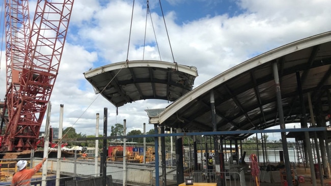 A piece of the Drift roof being craned off site last week.