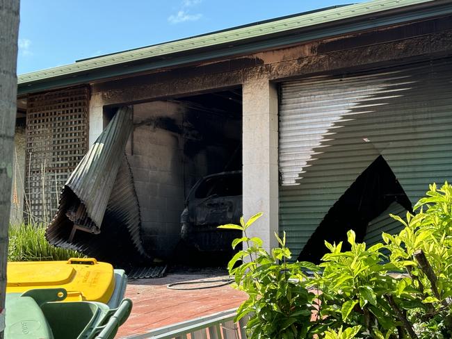 Emergency crews were called to Mornington Street in Kewarra beach on Thursday morning as a fire ripped through a home destroying a car in the garage. Photo: Dylan Nicholson