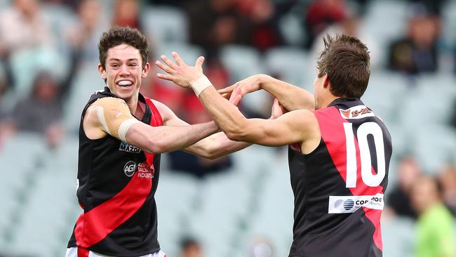 Hugh Haysman celebrates with West Adelaide teammate Kaine Stevens. Haysman earlier this month returned to the Bloods line-up for the first time in almost two years following a significant wrist injury. Picture: Sarah Reed.