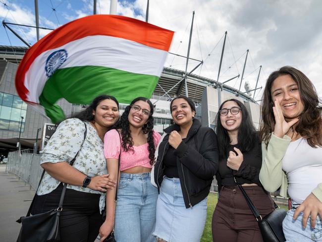 Mad Indian fans (L-R) Merrin, Melvi, Alvi, Chelsy and  Ada. Indian fans outside the nets at the MCG whilst the the Indian T20 team trains ahead of the Indian cricket match on Sunday. Picture: Tony Gough