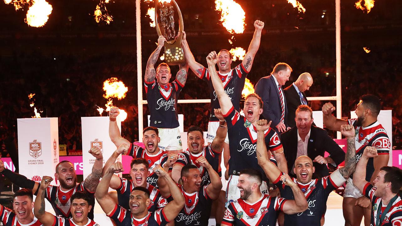 Jake Friend and Boyd Cordner lift the Provan Summons Trophy. Picture. Phil Hillyard