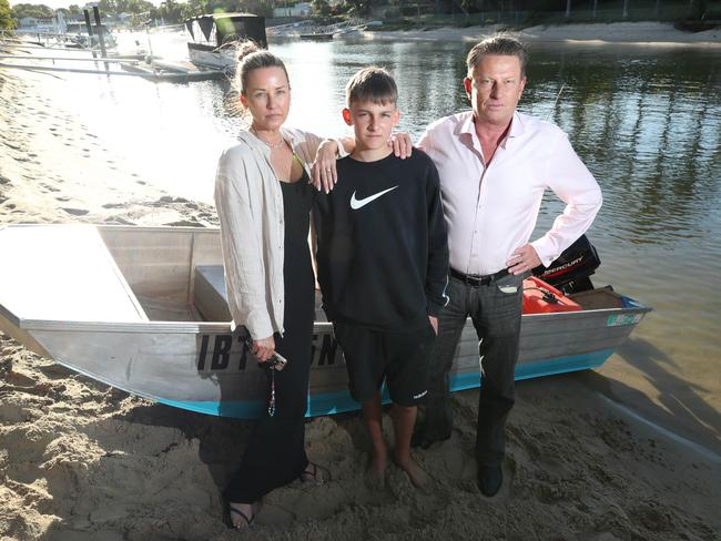 Ran and Lisa McDonald with son Ari at their Broadbeach Waters home. Picture: Glenn Hampson