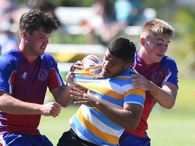 Northern Pride player Jason Hastie (middle) pictured playing for Mareebra SHS in the Boys Rugby League State Championship.