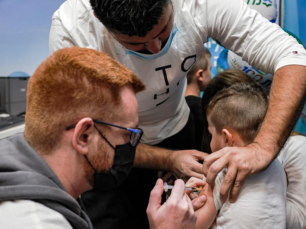A five-year-old child receives the Pfizer vaccine in Jerusalem, Israel. Picture: Menahem Kahana/AFP