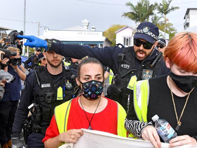 Police yelling at protesters at Kangaroo Point. Picture, John Gass