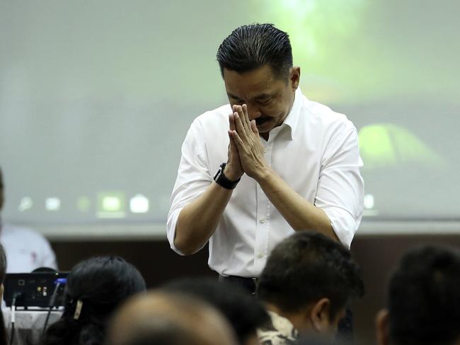 Founder and owner of Lion Air Rusdi Kirana bows in front of relatives of the victims in the crashed Lion Air jet during a press conference in Jakarta. Picture: AP