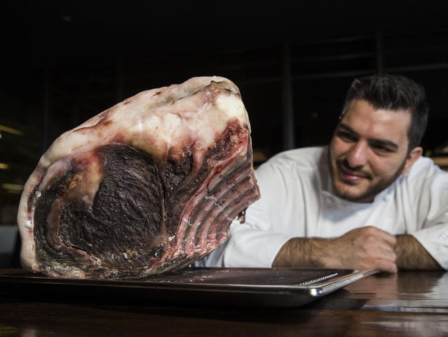 Chef Dany Karam with the meat that creates Sydney's most expensive steak at Black Restaurant, The Star. Picture: Dylan Robinson