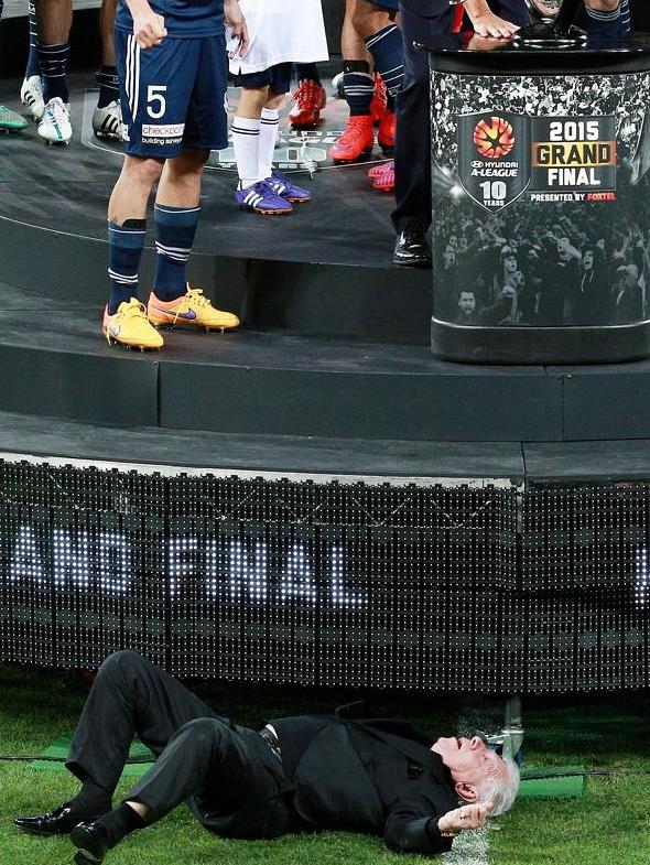 ... and falls off the stage.