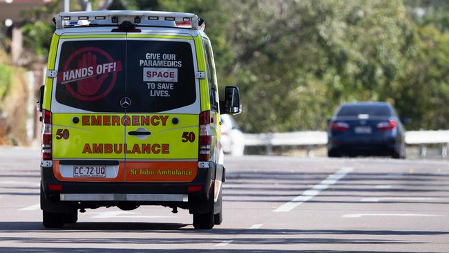 An ambulance is seen leaving the Mash Suites  in Darwin CBD, Tuesday, July 16, 2019. Police and health department staff spent almost 20 hours at the building before he was taken into the care of paramedics. Picture: KERI MEGELUS