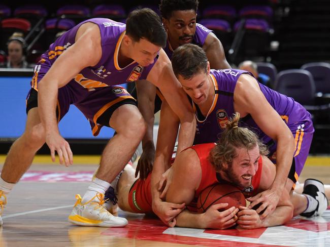 Wildcats Jesse Wagstaff is tackled during Game 3 of the NBL Finals match between Sydney Kings and Perth Wildcats at Qudos Bank Arena in Sydney, Sunday, March 15, 2020. (AAP Image/Mick Tsikas) NO ARCHIVING, EDITORIAL USE ONLY