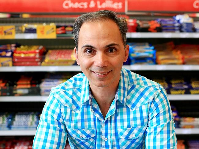 Saeed Fassaie taught himself to read English while reading The Daily Telegraph on his shift at a petrol station. Picture: Adam Taylor