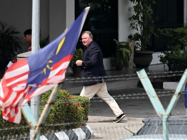A man believed to be the father of one of the Australian men remanded in custody at the Sepang Police Station. Picture: Jack Tran