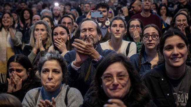 People gathered in what's known as Hostages Square react to news that the first Israeli hostages have been released after a ceasefire agreement began between Israel and Hamas on January 19. Picture: Chris McGrath/Getty Images