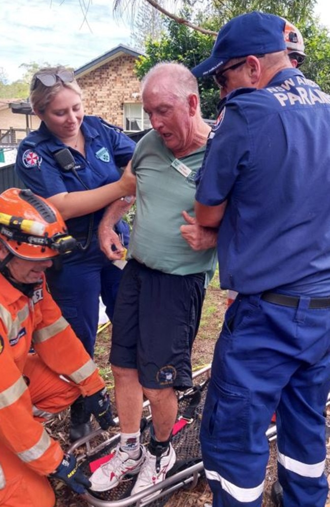 Bob Hood being assisted by SES and NSW Ambulance crews at Port Macquarie.