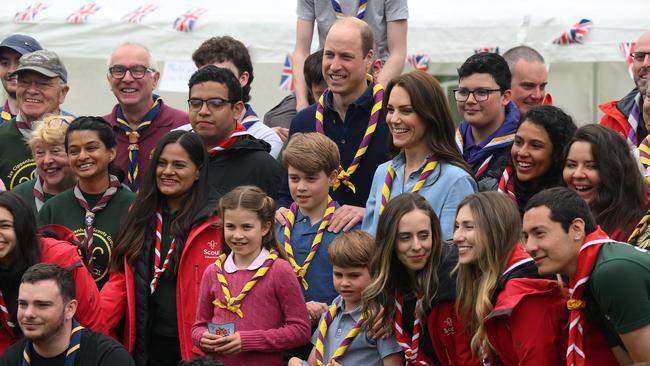 Catherine, Princess of Wales, Prince William, Prince of Wales, Prince George of Wales, Prince Louis of Wales and Princess Charlotte of Wales pose for a group pictures with volunteers who are taking part in the Big Help Out, during a visit to the 3rd Upton Scouts Hut in Slough on May 8, 2023 in London, England. (Photo by Daniel Leal - WPA Pool/Getty Images)