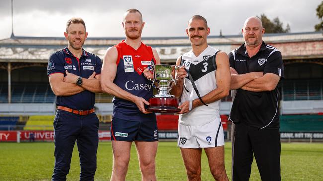 Mark Corrigan and Mitch White (coach and captain, Casey Demons) and Steve Daniel and Jacob Dawson (coach and captain, Southport Sharks) ahead of the grand final. Photo: AFL Photos.