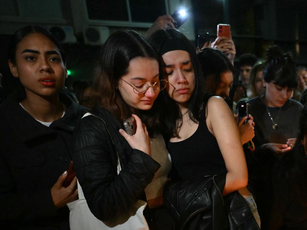 Fans of British singer Liam Payne gather next to the hotel where he died in Buenos Aires. Picture: AFP