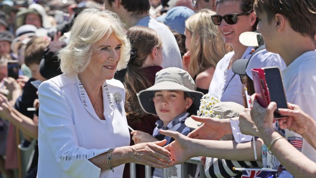 Queen Camilla meets members of the public during a visit to the For Our Country memorial. Picture: Lisa Maree Williams/Getty Images