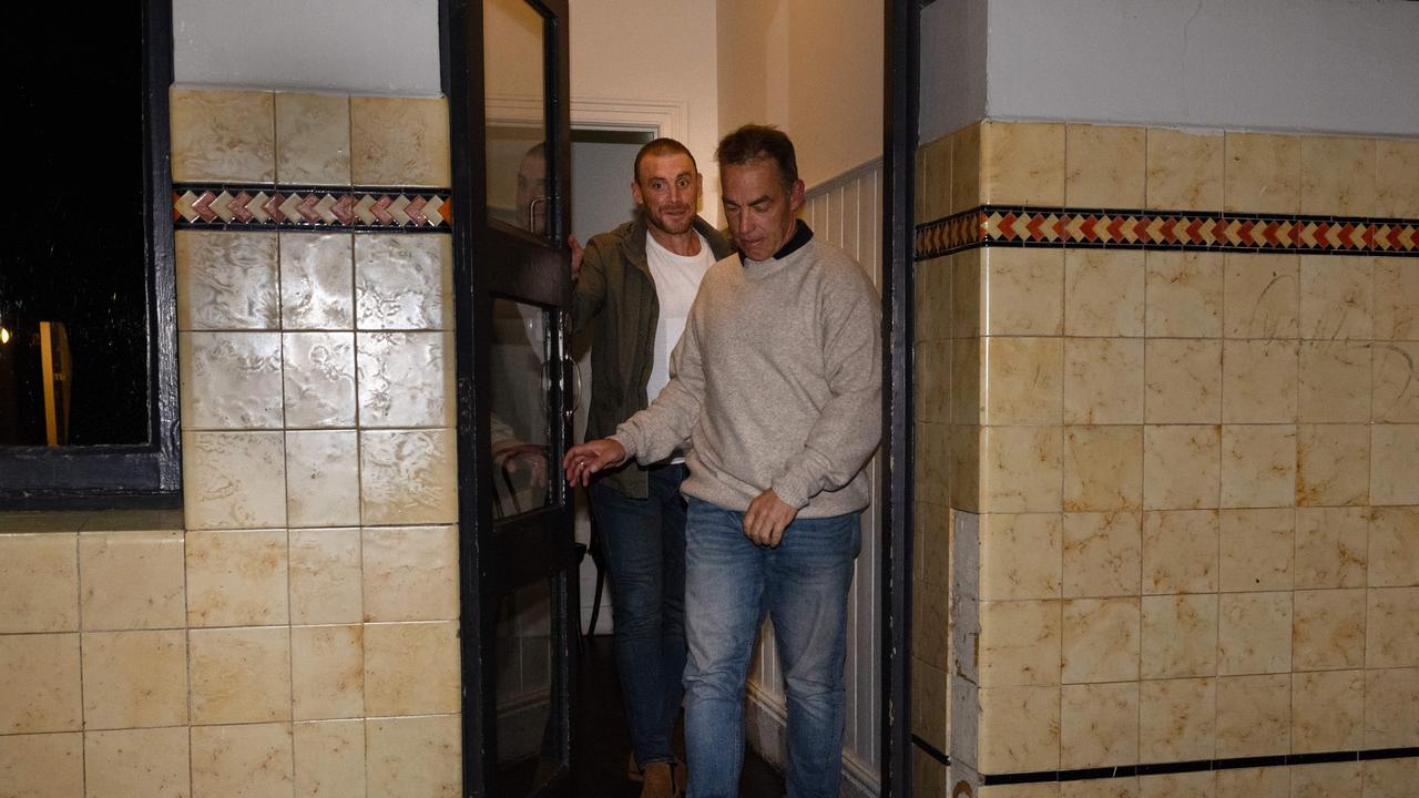 Simon Goodwin and Alastair Clarkson leave the pub. Picture: Jason Edwards